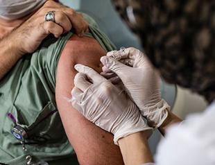 Minister calls on public to help give jab drive momentum