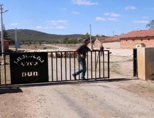 Locals enter, exit village through door