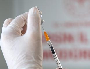 Minister calls for coordinated action to accelerate jab drive