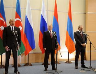 Putin urges Armenia, Azerbaijan to ease tensions in rare meeting