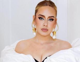 Adele tops UK album and singles chart