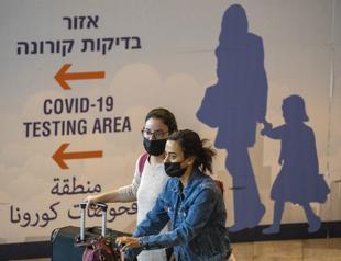 Israel closes borders to all foreigners over Omicron