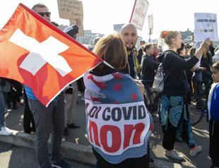 Swiss vote on COVID law amid sharp rise in infections