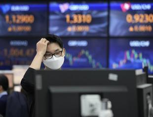 Omicron variant raises new fears for pandemic-hit world economy