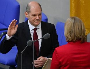 Scholz succeeds Merkel as German chancellor, opening new era