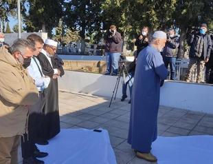 Bodies of Ottoman Turks reburied with rites, prays