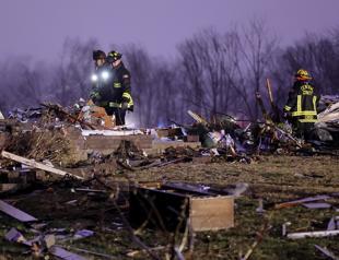 Powerful tornadoes kill dozens across six US states