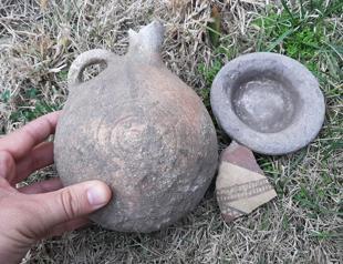 Ancient mound unearthed under dam water