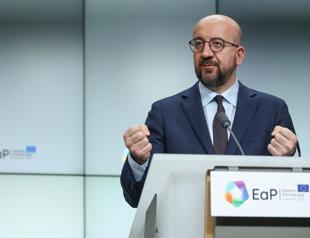 EU warns Russia, vows support for sceptical Ukraine