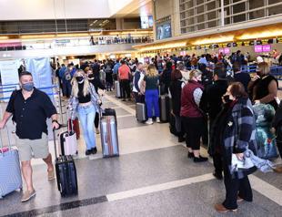 Biden says US prepared for Omicron as Israel calls for 4th shots