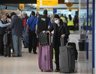 Scrapped flights, resurgent COVID deliver Christmas gut punch