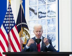 Biden urges concern but not alarm in US as omicron rises