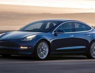 Tesla reports record profit, sees more supply chain woes