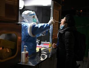 China quietly locks down area near Beijing with Olympics a week away