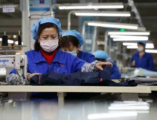 China factory activity edges down in January