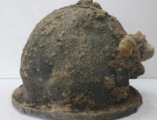 Ancient helmets, temple ruins found at dig in Italy