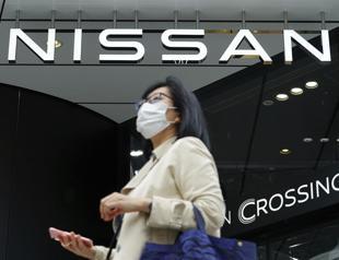 Nissan hikes net profit forecast again despite chip shortage