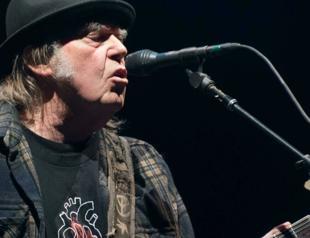 Neil Young urges Spotify employees to quit