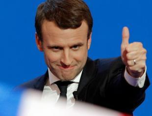 Macron, not candidate but already campaigning for reelection