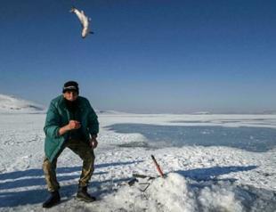 Lake Çıldır awaits visitors with its frozen surface