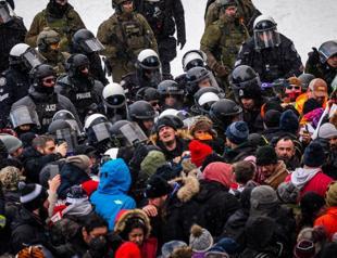 Show of force in Ottawa as police clear main protest hub