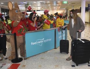 Australia welcomes back tourists with toy koalas, Tim Tams