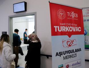 Minister hails success in double-jab rate