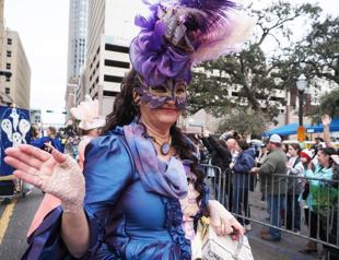 Toned-down Mardi Gras amuses revellers
