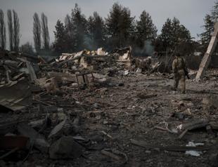 Russian forces squeeze Kyiv, surround Mariupol