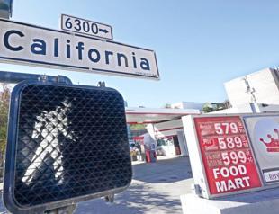 Average US gas price rises 22 percent in two weeks to record $4.43