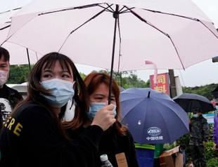 Search at China crash site suspended amid rain