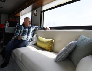 Man in caravan says never goes home