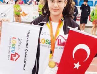 Young woman beats cancer to win gold medal