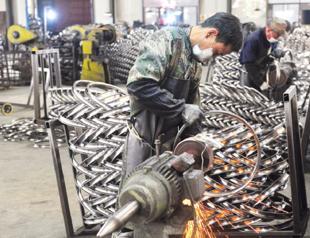 China’s economy grows still-weak 4.8 percent