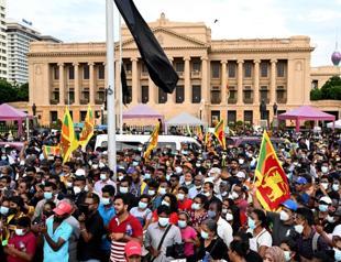 Sri Lanka leader trims cabinet of relatives ahead of IMF talks