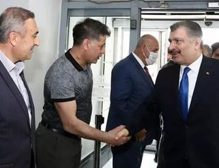 Health minister hints ‘end of pandemic’ by shaking hands with citizens