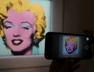 Warhol portrait of Marilyn Monroe fetches record $195 mn