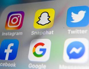 Tech titans curb hiring in a ‘challenging macro environment’