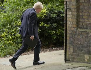 UK’s Johnson faulted for lockdown parties but won’t quit