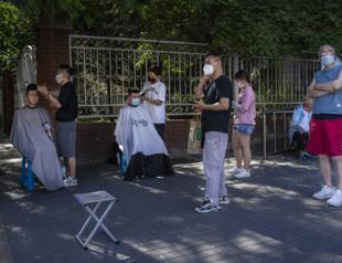 China premier issues warning on COVID-hit economy