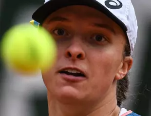 Swiatek racks up 31st straight win