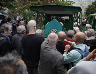 Prominent cartoonist laid to rest