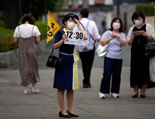 Japan eases foreign tourism ban, allows guided package tours