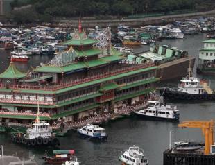 Victim of pandemic, Hong Kong floating restaurant towed away