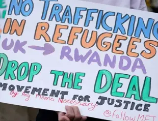 UK vows to pursue asylum policy after Rwanda flight cancelled