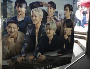 Shares of BTS label tumble after band announces break