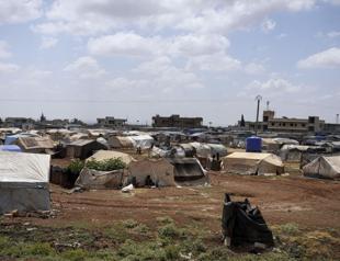 Syrians living in camps seeking return home