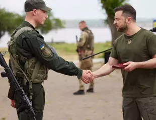 Zelensky vows to retake south, NATO warns of long war