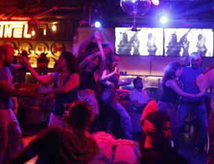 Away from war, Syrians find their rhythm in ballroom dancing