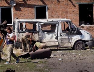 EU debates Ukraine candidacy as Russia makes life ’hell’ in east